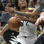 
              Utah Jazz guard Collin Sexton (2) goes to the basket during the first half of the team's NBA basketball game against the Los Angeles Clippers on Wednesday, Jan. 18, 2023, in Salt Lake City. (AP Photo/Rick Bowmer)
            
