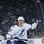 
              Tampa Bay Lightning forward Corey Perry celebrates after scoring a goal during the first period of an NHL hockey game against the Seattle Kraken, Monday, Jan. 16, 2023, in Seattle. (AP Photo/Stephen Brashear)
            
