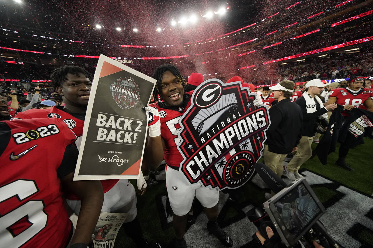 Georgia players celebrate a win over TCU after the national championship NCAA College Football Play...
