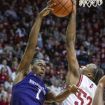 
              Indiana guard Tamar Bates (53) blocks a shot by Northwestern guard Chase Audige (1) during the first half an NCAA college basketball game, Sunday, Jan. 8, 2023, in Bloomington, Ind. (AP Photo/Doug McSchooler)
            