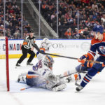 
              New York Islanders goalie Ilya Sorokin (30) is scored against by Edmonton Oilers' Zach Hyman (18) during second-period NHL hockey game action in Edmonton, Alberta, Thursday, Jan. 5, 2023. (Jason Franson/The Canadian Press via AP)
            