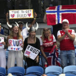 
              Supporters of Casper Ruud of Norway react during his second round match against Jenson Brooksby of the U.S. at the Australian Open tennis championship in Melbourne, Australia, Thursday, Jan. 19, 2023. (AP Photo/Dita Alangkara)
            