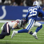 
              Indianapolis Colts safety Rodney Thomas II (25) tries to get past Houston Texans running back Rex Burkhead (28) during the second half of an NFL football game between the Houston Texans and Indianapolis Colts, Sunday, Jan. 8, 2023, in Indianapolis. (AP Photo/Darron Cummings)
            