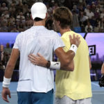 
              Karen Khachanov, left, of Russia consoles Sebastian Korda of the U.S. after Korda withdrew from their quarterfinal match with an injured wrist at the Australian Open tennis championship in Melbourne, Australia, Tuesday, Jan. 24, 2023 (AP Photo/Ng Han Guan)
            