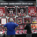 
              Memorabilia is displayed at a fan fest at the Los Angeles Convention Center, Thursday, Jan. 5, 2023, in Los Angeles. Georgia is scheduled to face TCU, Monday for the CFP national football championship in Inglewood, Calif. (AP Photo/Marcio Jose Sanchez)
            