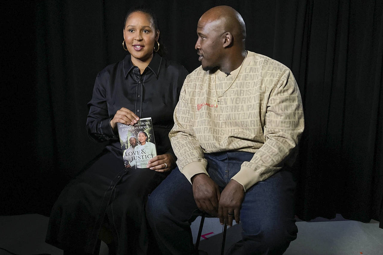 Maya Moore, left, and her husband, Jonathan Irons, answer questions and pose during an interview, M...
