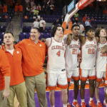 
              Clemson head coach Brad Brownell celebrates his 400th win with his team after an NCAA college basketball game against Duke in Clemson, S.C., Saturday, Jan. 14, 2023. Clemson won 72-64. (AP Photo/Artie Walker Jr.)
            