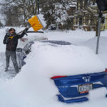
              FILE - Christian Parker of Buffalo, N.Y., shovels out his car in the Elmwood Village neighborhood of Buffalo, N.Y. Monday, Dec. 26, 2022, after a massive snow storm blanketed the city. The Buffalo Bills have been a reliable bright spot for a city that has been shaken by a racist mass shooting and back-to-back snowstorms in recent months. So when Bills safety Damar Hamlin was critically hurt in a game Monday, the city quickly looked for ways to support the team. (AP Photo/Craig Ruttle, File)
            