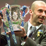 
              FILE - Chelsea's player and manager Gianluca Vialli celebrates with the Coca-Cola Cup trophy after his Chelsea team beat Middlesbrough 2-0 in the final at London's Wembley stadium, Sunday, March 29, 1998. Gianluca Vialli, the former Italy striker who helped both Sampdoria and Juventus win Serie A and European trophies before becoming a player-manager at Chelsea, has died on Friday, Jan. 6, 2023. He was 58. (AP Photo/Max Nash, File)
            