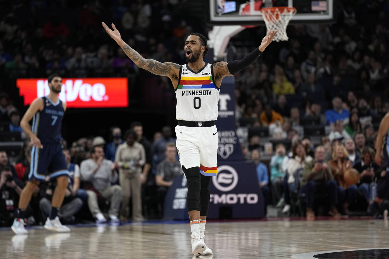 Minnesota Timberwolves guard D'Angelo Russell (0) celebrates after a three-point basket by forward ...