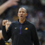 
              Phoenix Suns head coach Monty Williams argues for a call in the first half of an NBA basketball game against the Denver Nuggets Wednesday, Jan. 11, 2023, in Denver. (AP Photo/David Zalubowski)
            
