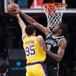 
              Brooklyn Nets center Day'Ron Sharpe (20) blocks a shot by Los Angeles Lakers forward Juan Toscano-Anderson (95) during the first half of an NBA basketball game Monday, Jan. 30, 2023, in New York. (AP Photo/Corey Sipkin)
            