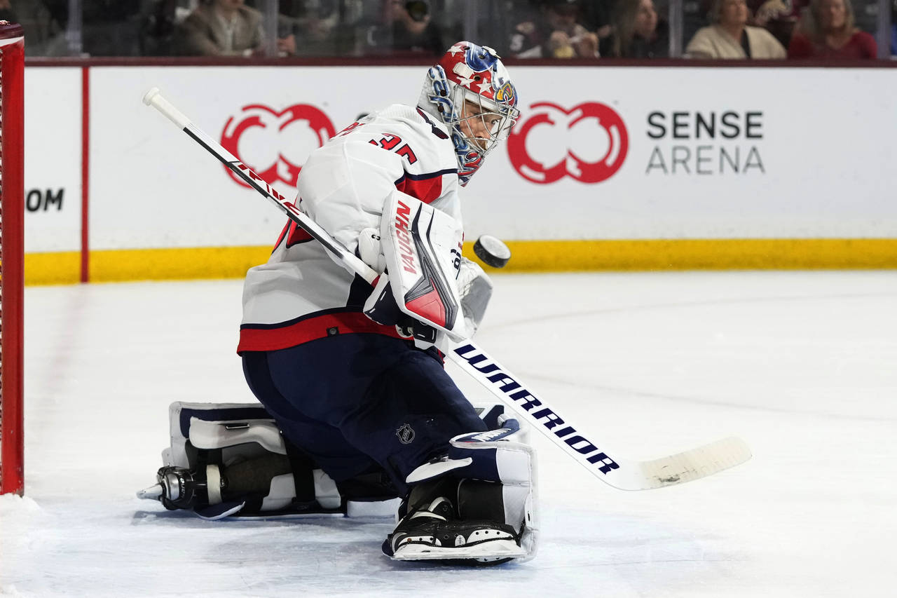 Washington Capitals goaltender Darcy Kuemper makes a save against the Arizona Coyotes during the fi...