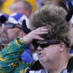 
              CORRECTS TO NORTH DAKOTA STATE NOT NORTH DAKOTA - A North Dakota State fan watches the first half of the FCS Championship NCAA college football game against the South Dakota State, Sunday, Jan. 8, 2023, in Frisco, Texas. (AP Photo/LM Otero)
            