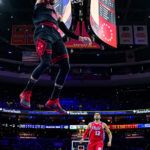 
              Chicago Bulls' Zach LaVine dunks as Philadelphia 76ers' Tobias Harris (12) watches during the first half of an NBA basketball game, Friday, Jan. 6, 2023, in Philadelphia. (AP Photo/Chris Szagola)
            