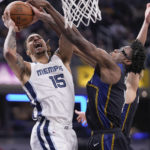 
              Memphis Grizzlies forward Brandon Clarke, left, is fouled by Indiana Pacers forward Jalen Smith during the first half of an NBA basketball game in Indianapolis, Saturday, Jan. 14, 2023. (AP Photo/AJ Mast)
            