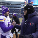 
              Minnesota Vikings quarterback Kirk Cousins greets Chicago Bears quarterback Justin Fields, right, after an NFL football game, Sunday, Jan. 8, 2023, in Chicago. The Vikings won 29-13. (AP Photo/Charles Rex Arbogast)
            