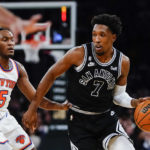 
              San Antonio Spurs' Josh Richardson (7) drives past New York Knicks' Immanuel Quickley (5) during the first half of an NBA basketball game Wednesday, Jan. 4, 2023, in New York. (AP Photo/Frank Franklin II)
            