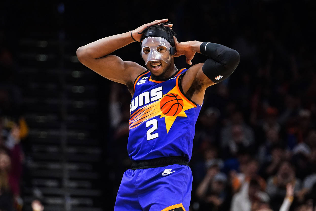 Phoenix Suns' Josh Okogie (2) hams it up after making a 3-pointer against the Indiana Pacers during...