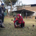 
              Archers sort arrows after the first round of an archery event in Shillong, India, Monday, Jan. 16, 2023. Each afternoon, except on Sundays and public holidays, this event takes place in a small field and people place bets on the results. (AP Photo/Ashwini Bhatia)
            