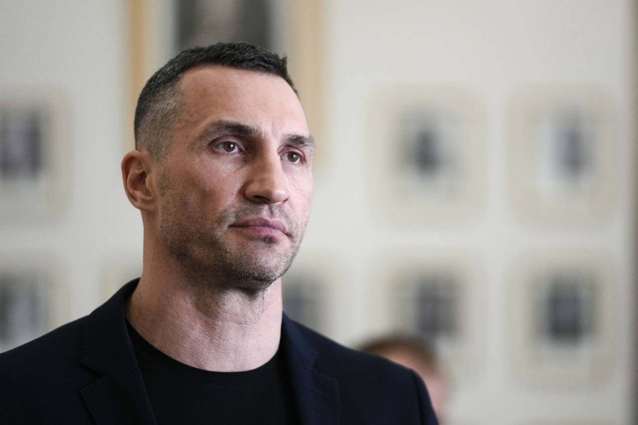 FILE - Former heavyweight boxing world champion Wladimir Klitschko leaves after a meeting with Germ...