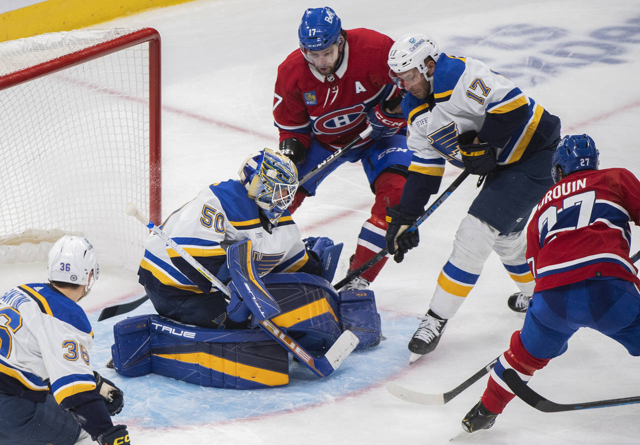 Montreal Canadiens' Jonathan Drouin (27) scores against St. Louis Blues goaltender Jordan Binningto...