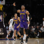 
              Los Angeles Lakers guard Russell Westbrook (0) celebrates after shooting a 3-pointer during the first half of an NBA basketball game against the Memphis Grizzlies in Los Angeles, Friday, Jan. 20, 2023. (AP Photo/Ashley Landis)
            