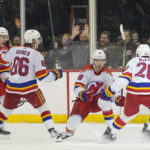 
              New Jersey Devils defenseman Damon Severson (28) celebrates after scoring the game-winning goal in overtime of an NHL hockey game against the New York Rangers, Saturday, Jan. 7, 2023, in Newark, N.J. The Devils won 4-3. (AP Photo/Mary Altaffer)
            