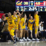 
              California guard Jayda Curry (30) celebrates a 3-point basket against Stanford during the second half of an NCAA college basketball game, Sunday, Jan. 8, 2023, in Berkeley, Calif. (AP Photo/D. Ross Cameron)
            