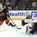 
              Anaheim Ducks right wing Troy Terry, left, tries to get a shot past Arizona Coyotes goaltender Connor Ingram during the second period of an NHL hockey game Saturday, Jan. 28, 2023, in Anaheim, Calif. (AP Photo/Mark J. Terrill)
            