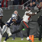 
              Tampa Bay Buccaneers wide receiver Julio Jones (6) makes the touchdown catch against Dallas Cowboys cornerback DaRon Bland (26) during the second half of an NFL wild-card football game, Monday, Jan. 16, 2023, in Tampa, Fla. (AP Photo/John Raoux)
            