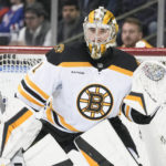 
              Boston Bruins goaltender Jeremy Swayman (1) protects his net during the first period of an NHL hockey game against the New York Rangers Thursday, Jan. 19, 2023, in New York. (AP Photo/Frank Franklin II)
            