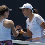 
              Zhang Shuai, right, of China is congratulated by Katie Volynets of the U.S. following their third round match at the Australian Open tennis championship in Melbourne, Australia, Saturday, Jan. 21, 2023. (AP Photo/Asanka Brendon Ratnayake)
            