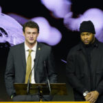 
              Mississippi State quarterback Will Rogers, left, reflects on impact on his life by the late Mississippi State head football coach Mike Leach, while linebacker Nathaniel Watson, waits to speak during Leach's memorial service in Starkville, Miss., Tuesday, Dec. 20, 2022. Leach died, Dec. 12, 2022, from complications related to a heart condition at 61. He was in his third year as head coach. (AP Photo/Rogelio V. Solis)
            
