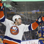 
              New York Islanders left wing Matt Martin celebrates after scoring a goal against the Buffalo Sabres during the second period of an NHL hockey game Thursday, Jan. 19, 2023, in Buffalo, N.Y. (AP Photo/Joshua Bessex)
            