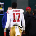 
              San Francisco 49ers quarterback Josh Johnson leaves the field during the second half of the NFC Championship NFL football game between the Philadelphia Eagles and the San Francisco 49ers on Sunday, Jan. 29, 2023, in Philadelphia. (AP Photo/Chris Szagola)
            