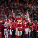
              Kansas City Chiefs quarterback Patrick Mahomes (15) cheers during the second half of an NFL divisional round playoff football game against the Jacksonville Jaguars, Saturday, Jan. 21, 2023, in Kansas City, Mo. The Kansas City Chiefs won 27-20.(AP Photo/Jeff Roberson)
            