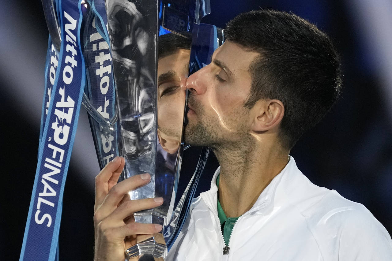 FILE - Serbia's Novak Djokovic poses with his trophy after defeating Norway's Casper Ruud in the si...