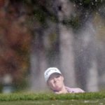 
              Ally Ewing hits a shot from the sand trap on the eighth hole during the first round of the LPGA Hilton Grand Vacations Tournament of Champions on Thursday, Jan. 19, 2023, in Orlando, Fla. (AP Photo/John Raoux)
            