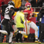 
              Kansas City Chiefs running back Isiah Pacheco (10) runs against Jacksonville Jaguars cornerback Tyson Campbell (32) during the first half of an NFL divisional round playoff football game, Saturday, Jan. 21, 2023, in Kansas City, Mo. (AP Photo/Charlie Riedel)
            