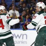 
              Minnesota Wild right wing Brandon Duhaime (21) celebrates his goal against the Buffalo Sabres with defenseman Matt Dumba (24) during the second period of an NHL hockey game Saturday, Jan. 7, 2023, in Buffalo, N.Y. (AP Photo/Jeffrey T. Barnes)
            