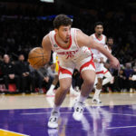 
              Houston Rockets' Alperen Sengun (28) grabs the ball during the first half of an NBA basketball game against the Los Angeles Lakers, Monday, Jan. 16, 2023, in Los Angeles. (AP Photo/Jae C. Hong)
            