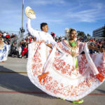 
              Banda de Música La Primavera, of Panama, dance along Colorado Boulevard during the 134th Rose Parade in Pasadena, Calif., Monday, Jan. 2, 2023. (Sarah Reingewirtz/The Orange County Register via AP)
            