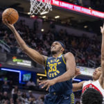 
              Indiana Pacers center Myles Turner (33) shoots during the second half of an NBA basketball game against the Toronto Raptors in Indianapolis, Monday, Jan. 2, 2023. (AP Photo/Doug McSchooler)
            