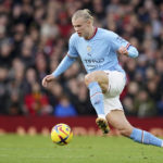 
              Manchester City's Erling Haaland controls the ball during the English Premier League soccer match between Manchester United and Manchester City at Old Trafford in Manchester, England, Saturday, Jan. 14, 2023. (AP Photo/Dave Thompson)
            