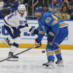 
              Tampa Bay Lightning's Steven Stamkos (91) shoots past St. Louis Blues' Calle Rosen (43) during the third period of an NHL hockey game Saturday, Jan. 14, 2023, in St. Louis. (AP Photo/Jeff Roberson)
            