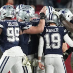 
              Dallas Cowboys place kicker Brett Maher (19) is congratulated after his extra point against the Tampa Bay Buccaneers during the second half of an NFL wild-card football game, Monday, Jan. 16, 2023, in Tampa, Fla. (AP Photo/Chris Carlson)
            