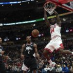 
              Chicago Bulls forward Patrick Williams dunks the ball during the first half of an NBA basketball game against the Los Angeles Clippers Tuesday, Jan. 31, 2023, in Chicago. (AP Photo/Erin Hooley)
            