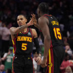
              Atlanta Hawks guard Dejounte Murray (5) is congratulated by teammate Clint Capela (15) during the fourth quarter of an NBA basketball game against the Dallas Mavericks in Dallas, Wednesday, Jan. 18, 2023. Hawks won 130-122. (AP Photo/LM Otero)
            