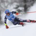 
              United States' Mikaela Shiffrin speeds down the course during an alpine ski, women's World Cup giant slalom, in Kronplatz, Italy, Tuesday, Jan. 24, 2023. (AP Photo/Alessandro Trovati)
            